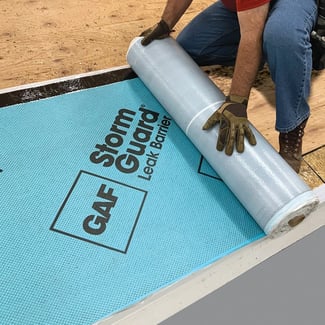 GAF Storm Guard being installed on a plywood deck