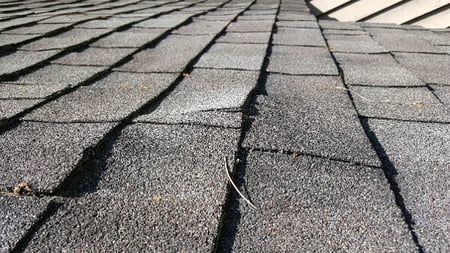 bad decking under shingles creating humps in the roof