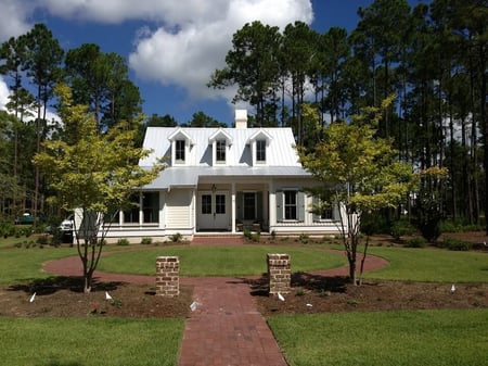 screw down metal roof home with dormers-3