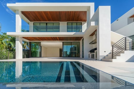 white modern home with pool