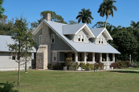 white house with metal roof